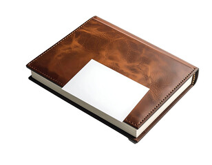 A textured brown leather-bound journal or notebook with a blank white card overlaying the cover against a black background.