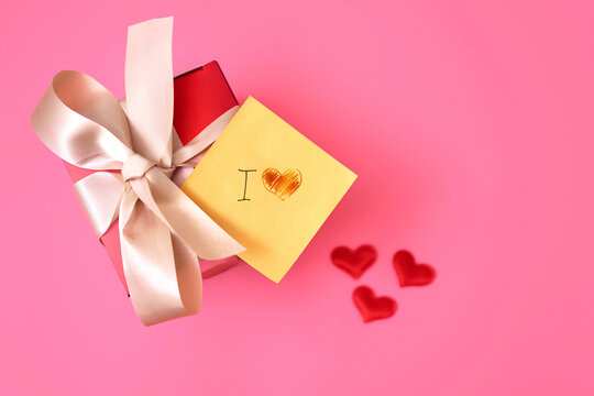 Giftbox with bow and I love you note for romantic celebration