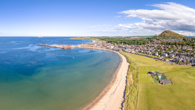 Aerial view of North Berwick west beach, harbour, golf course and coastline