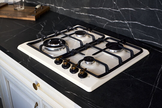 Gas hob cooktop country style design with aesthetic cream colored enamel and antiqued brass control knobs, cast iron grates and gas control function cuts off gas supply for safety built in countertop