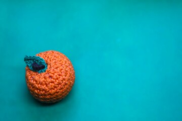 Crocheted Orange with Green Leaf