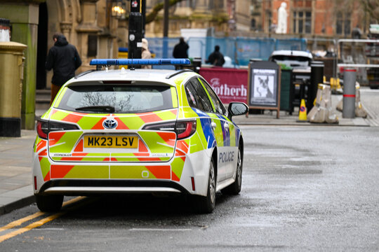 Greater Manchester Police emergency response cars parked outside Manchester town hall in the city centre. 