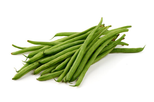 Fresh, green string beans with smooth surfaces, isolated on white background for healthy eating visuals