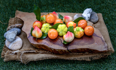 Kanom Look Choup : An old traditional thai dessert made from green been, coconut milk, sugar and...