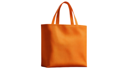 A blank orange paper shopping bag with handles is isolated on a white background as an empty retail gift container for store sales