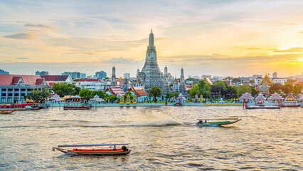 Wat Arun Ratchawararam at sunset(Temple of Dawn) famous tourist destination in Bangkok, Thailand.