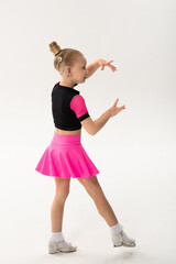 Young dancer with cochlear implant performing expressive sport dance movement. Hearing loss rehabilitation, auditory therapy, assistive technology, physical coordination, and confidence growth