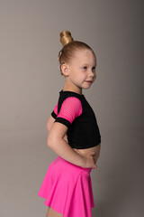 Portrait of child with cochlear implant during dance practice in studio. Hearing loss treatment, auditory rehabilitation, assistive medical device, emotional adaptation, and inclusive healthcare