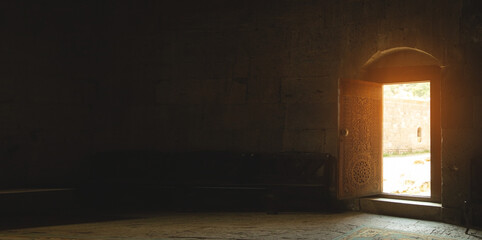 View of opened church wooden door.