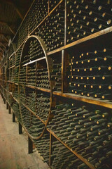 Wine bottles in a old warehouse. Wine storage