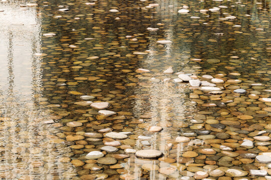 bottom stones shallow water brown color wet environment space background