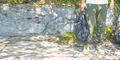 Human with a backpack in the outdoor.