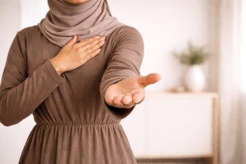 International womens day concept showing a woman in hijab with open hand, Give to Gain Campaign 2026, 8 march theme, support IWD © dvoevnore