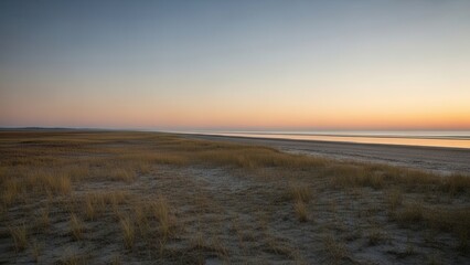 Peaceful Beach Sunset Over Calm Ocean Waters
