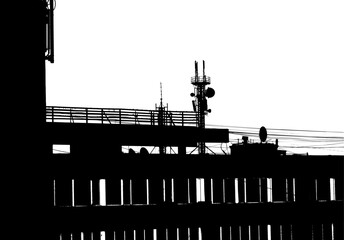 Bold black and white stencil style urban apartment block silhouette with graphic windows on the transparent background © swillklitch