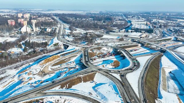 Krakow, Poland. Grebalow highway and tramway interchange under construction in winter. Partially open for traffic. Last fragment of ring road around Krakow. State in January 2026