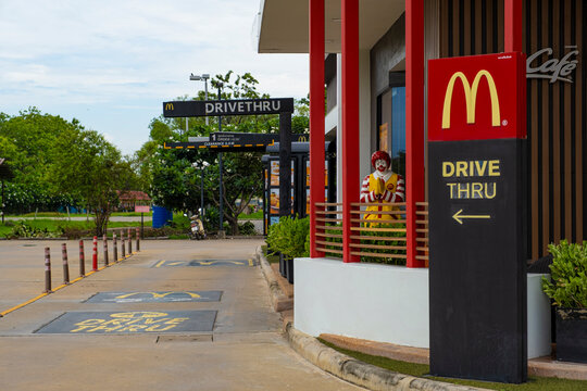 Bangkok,Thailand - November 5, 2025 : Mc Donald Mascot Sit on bench Brand Figure shop outdoor BANGKOK. Contemporary McDonald's Restaurant Exterior 