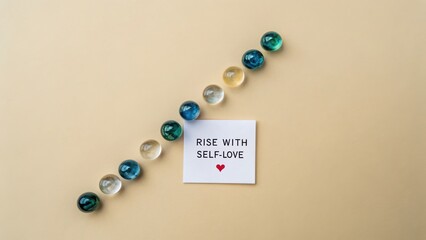 Marbles ascending a slope representing rise with self love