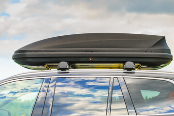 Trunk box fixed at roof top of the car © anetlanda