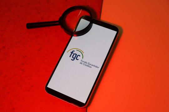 Salvador, Brazil - January 21, 2026: Fundo Garantidor de Creditos (FGC) logo displayed on smartphone screen. Brazilian bank deposit insurance. FGC logo.