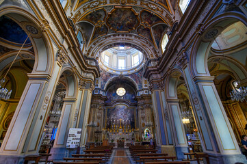 Naklejka premium The Church of San Nicola alla Carita in Naples, Italy with ornate frescoed ceilings, marble columns in baroque style.Ornate Baroque ceiling frescoes by Francesco Solimena