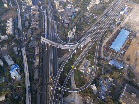 Aerial view of the Shri Atal Bihari Vajpayee Trans Harbour Link, a symphony of concrete and steel cutting through the urban landscape, Mumbai, Maharashtra, India.
