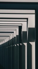 Obraz premium Repeating geometric architectural elements create strong linear perspective and dramatic shadows.