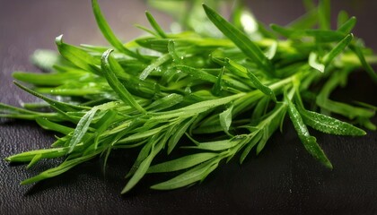 Fresh Tarragon Herb - Aromatic Culinary Ingredient on Dark Surface.