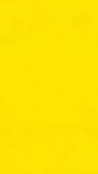 Vertical video: Frames pushing comic burst upward on screen, revealing yellow field with blue drops