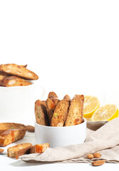 Italian cantucci cookies with nuts and candied fruits on a white background