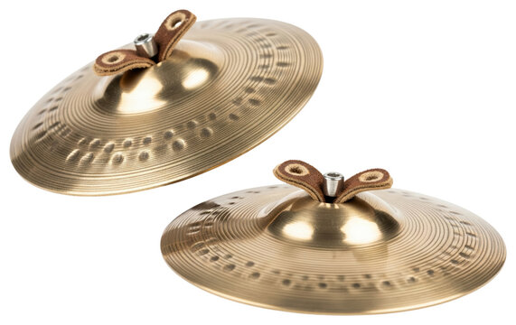 Pair of golden brass finger cymbals with brown leather loops isolated with transparent background