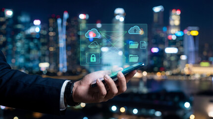 Businessman holds smartphone with holographic icons representing cloud computing, data security, and file sharing against cityscape background