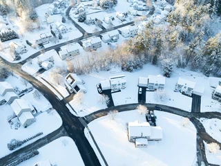 Fotobehang Natuur Park aerial view of residential community in winter after snow under sunlight  © nd700