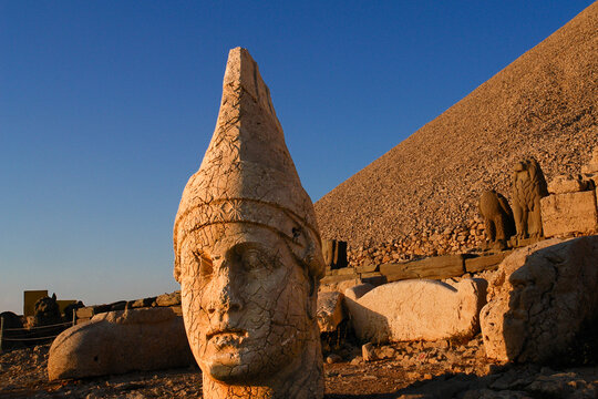 Monumental god heads in Nemrut Mount, T&uuml;rkiye. The mount where several large statues are erected around what is assumed to be a royal tomb from the 1st century BC.