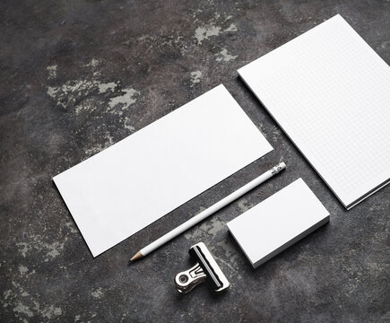 Blank branding identity set on on concrete surface. Corporate stationery template.