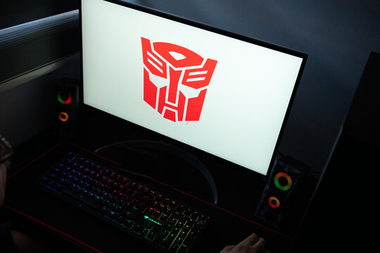 Punta Arenas, Chile &ndash; January 20, 2026: Transformers Autobot insignia displayed on a computer monitor in a dark room with RGB lighting
