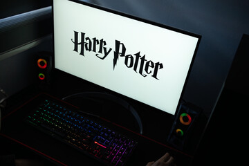 Obraz premium Punta Arenas, Chile – January 20, 2026: Harry Potter wizarding world franchise logo displayed on a computer monitor in a dark room