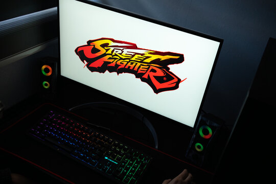Punta Arenas, Chile &ndash; January 20, 2026: A desktop monitor featuring the stylized Street Fighter logo alongside glowing computer peripherals and RGB lighting