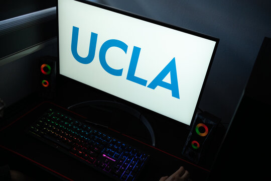 Punta Arenas, Chile &ndash; January 20, 2026: A desktop monitor featuring the stylized UCLA wordmark alongside glowing computer peripherals