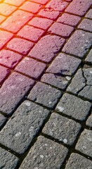 Detailed close-up of a rustic, weathered gray pavement composed of interlocking rectangular stone blocks, providing a textured background, paving, floor, road