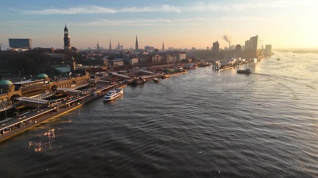 Aerial drone footage of beautiful sunrise over the St. Pauli Landungsbr&uuml;cken in Hamburg