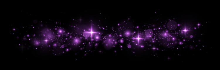 Shiny particles in purple glow with magical light on vibrant holiday background. © FlammaChe