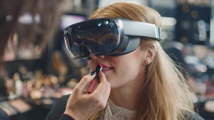 Medium shot of a woman engaging in a virtual reality makeup trial exploring different lipstick and eyeshadow options in a hightech beauty salon setting.