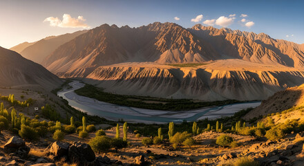 A serene mountain landscape with a winding river at sunset