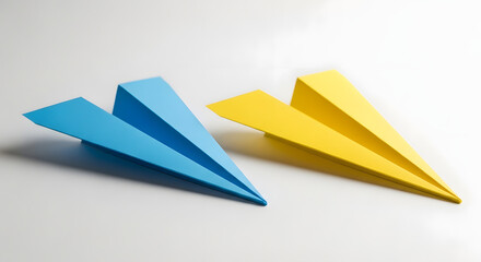 Blue and Yellow Paper Airplanes