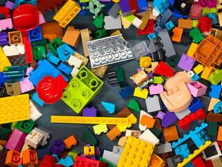 Naklejka premium Colorful assortment of lego bricks and pieces
