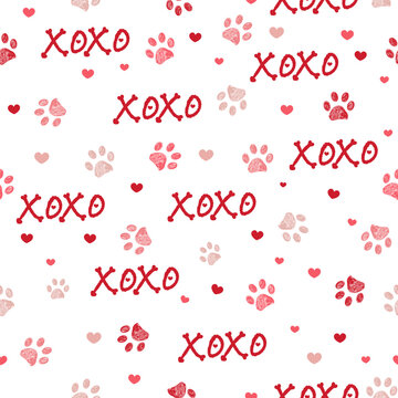 Red hearts paw prints and xo text seamless fabric design pattern