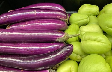 eggplants and chayote squash in the market