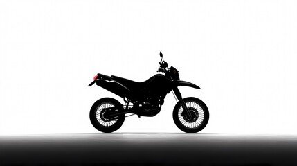 Fototapeta premium Motorcycle Silhouette: A sleek, black motorcycle stands in stark silhouette, highlighting its dynamic design and the thrill of the open road.