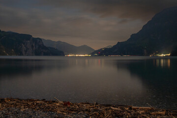 Lake Lucerne night reflecting mountain lights and nature